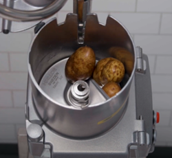 Loading a Hobart food processor